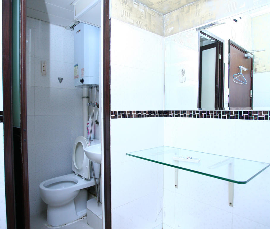 H K Commercial Inn Kowloon  Quarto foto