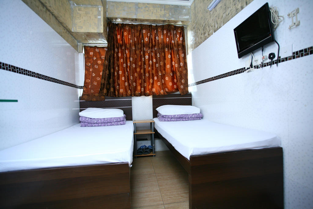 H K Commercial Inn Kowloon  Quarto foto